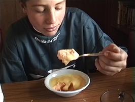 Luke Whiting enjoys his speciality dessert - Peach Angel Delight with tinned custard